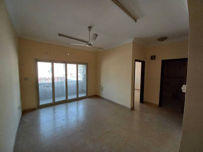 Front of road Huge size 1bhk with balcony only 18k for Family in muwaileh