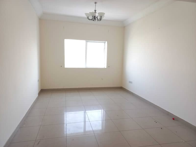 900 sq-ft 1bhk with one month free, one parking free in al Taawun area rent 23k in 4/6 cheqs