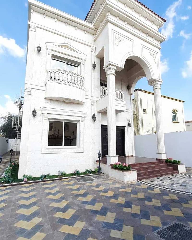 Without a down payment from the buyer for sale, a villa with a stone face, opposite the mosque, with the design of palaces and super deluxe finishing,