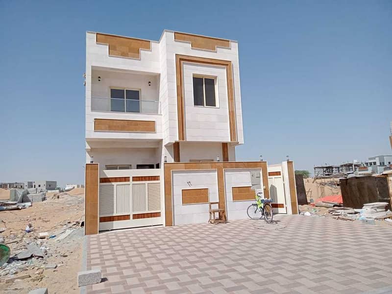 A new luxury villa with a modern design, fully finished, Super Dulux, for sale in Ajman, Al Zahia area. .