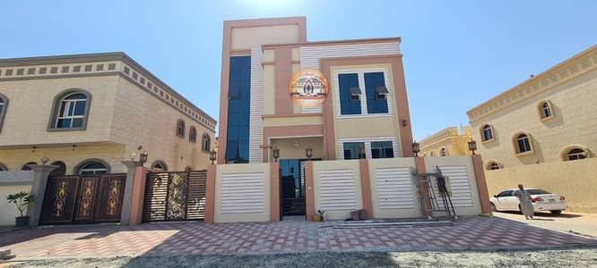 5 Bedroom Villa for Sale in Al Helio, Ajman - Own a distinctive villa, modern design, very elegant, without service fees, free ownership for life, on Al-Jar Street, with bank facilities 5 Bedroom Villa for Sale in Al Helio, Ajman - Own a distinctive villa, modern design, very elegant, without service fees, free ownership for life, on Al-Jar Street, with bank facilities