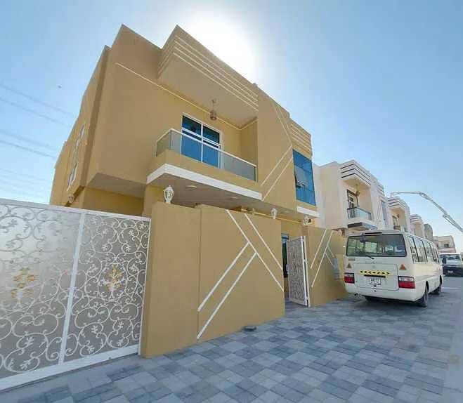 Villa of the most luxurious villas in Ajman, with personal construction and finishing on the asphalt street, without down payment and at a price of a