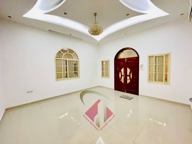 Urgent sale villa in Ajman connected to electricity and water with air conditioners on a street underway, very excellent finishing, without down payme