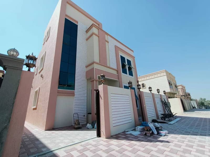 Without a down payment, buy a new villa in Ajman, freehold for all nationalities, excellent location and finishing on the highway direct