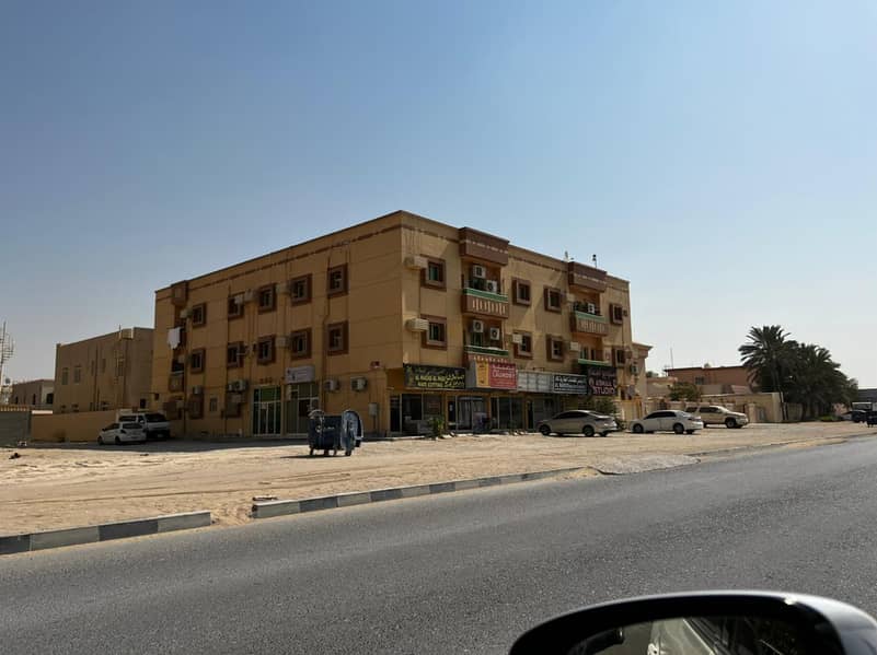 For sale Laqta building in Al-Rawdah on the street with an income of 10%