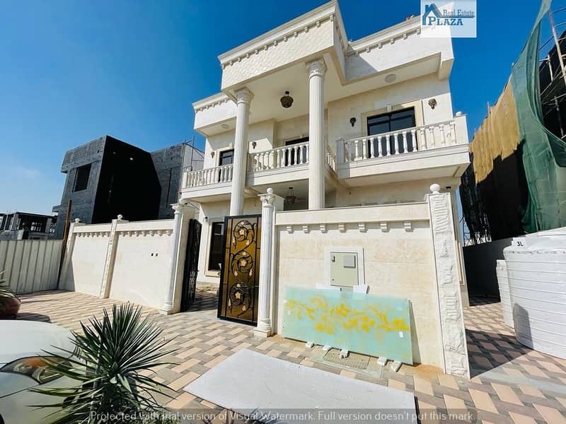 _ Hurry up with a new luxury villa with a complete modern design for sale in Ajman, personal finishing, central air conditioning, on a main street