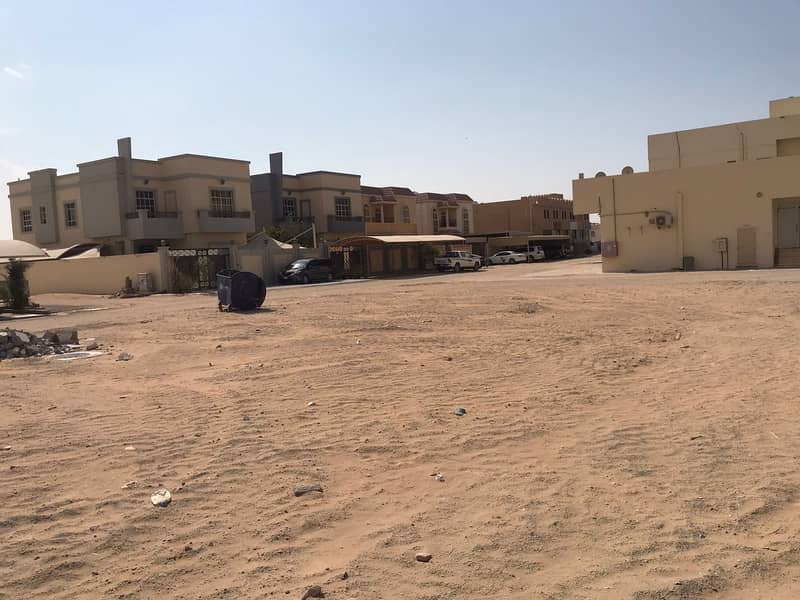 For sale a plot of commercial residential land +2 in an excellent location on two streets in the Emirate of Ajman, Al Rawda area 2