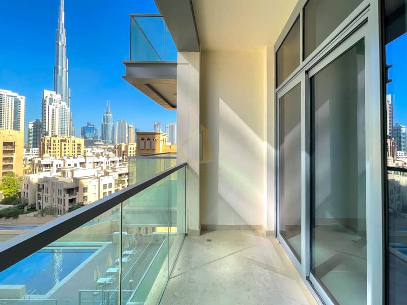 Pool and Burj Khalifa Views | Brand New 1BR | Closed Kitchen