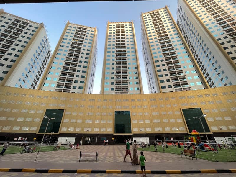 PERFECTLY PRICED BEST FOR INVETMENT SPACIOUS 1BHK IN AJMAN PEARL  WITH PARKING TOWER FOR SALE. .