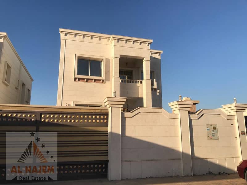 For sale, a very luxurious stone villa on the main street with central air conditioning, electricity, water and furniture in Al Rawda 2 area in Ajman
