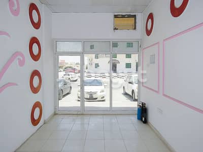 Shop for Rent in Al Rawda, Ajman - SHOP 13000 FOR RENT 2 MONTH FREE NO COMM. DIRECT FROM OWNER   NEAR SHEIKH AMMAR STREET ABBAYA ROUNDABOUT