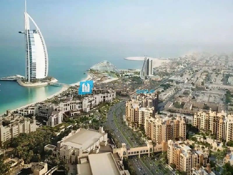 Burj and Sea view | Beachfront Living |Luxury Unit