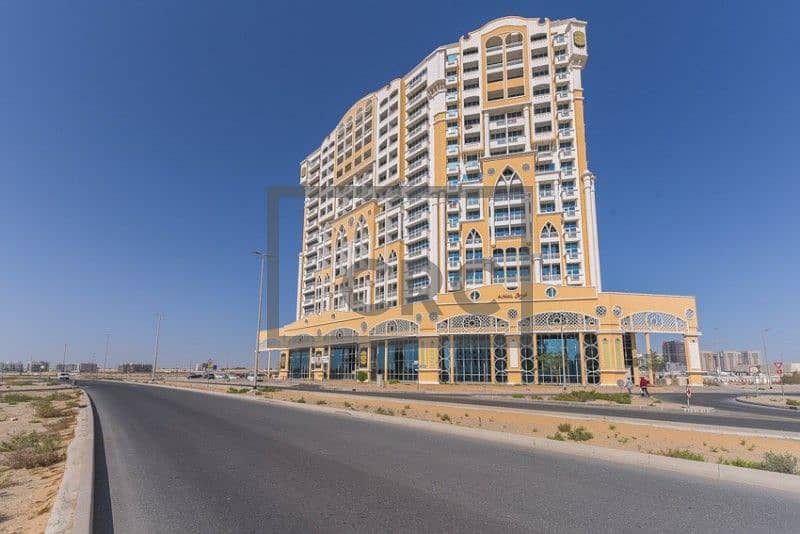 محل تجاري في برج أجمل سارة مجمع دبي ريزيدنس 126500 درهم - 5481285