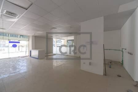 Shop for Sale in Dubailand, Dubai - Main Road | Fitted | Open Plan
