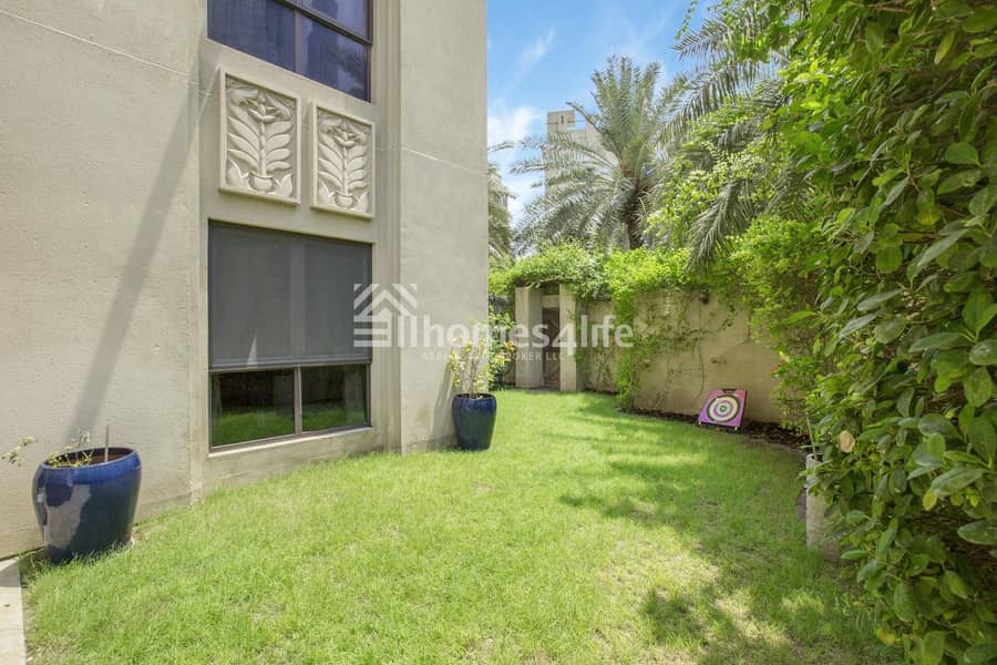 Burj View with Private Garden 3BR + Maids
