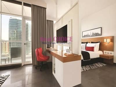 شقة فندقية  للبيع في برشا هايتس (تيكوم)، دبي - شقة فندقية في فندق سكاي سنتر برشا هايتس (تيكوم) 600000 درهم - 5317571