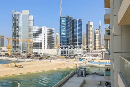 1 Bedroom Apartment for Sale in Business Bay, Dubai - Corner unit|Full bay view|Partial burj view