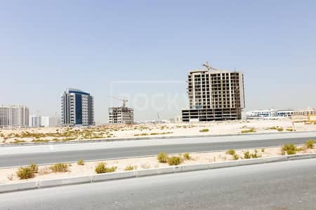 Mixed Use Land for Sale in Dubailand, Dubai - Unique G+29  Plot | Good ROI | Prime Location