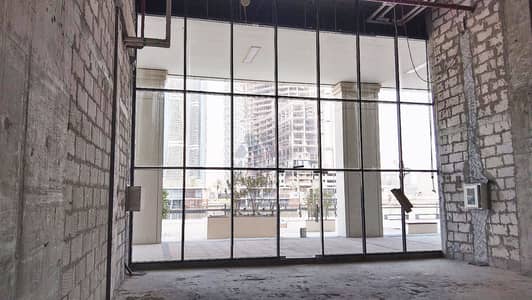Shop for Rent in Business Bay, Dubai - 3 Months Free | Canal Views | Shell & Core | Spacious Shop