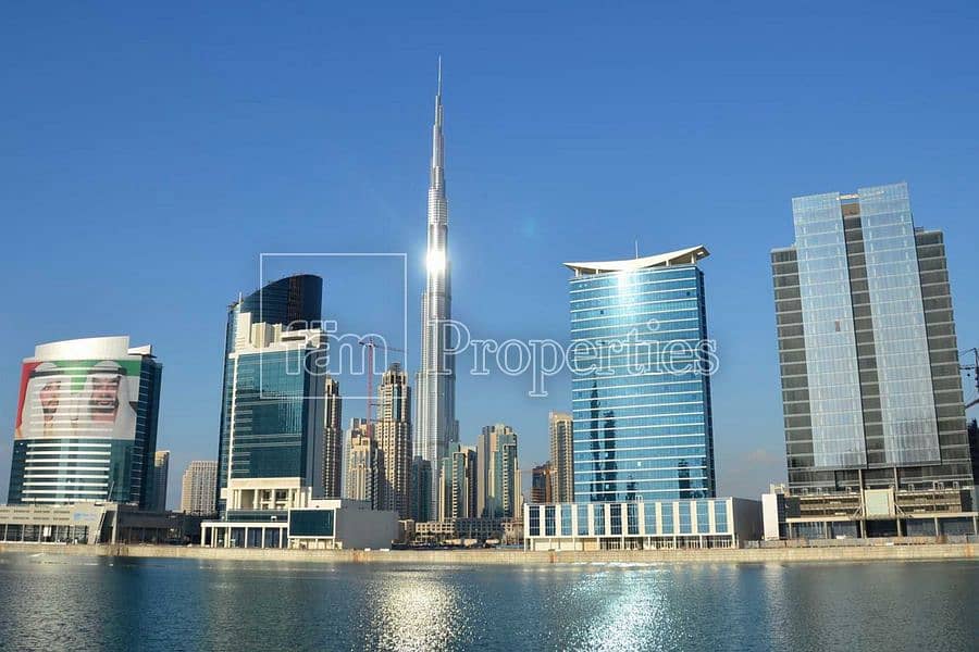 13 Overlooking view of Dubai Canal and Burj Khalifa