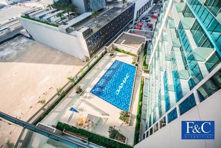 Studio for Sale in Business Bay, Dubai - High Floor | Pool View | Ready to Move In