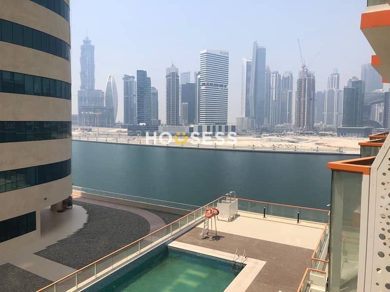 Pool and Canal view. . . Ready to move in one bed room apartment with balcony