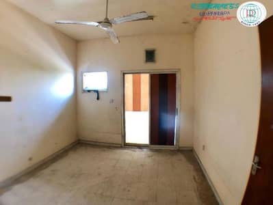 1 Bedroom Apartment for Rent in Industrial Area, Sharjah - 1 B/R HALL FLAT FOR BACHELORS IN INDUSTRIAL AREA 1, SHARJAH