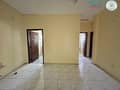 6 12 months contract and one month free SPACIOUS 2 B/R HALL FLAT WITH BALCONY IN UMM AL TARAFA AREA NEAR KM TRADING ROLLA