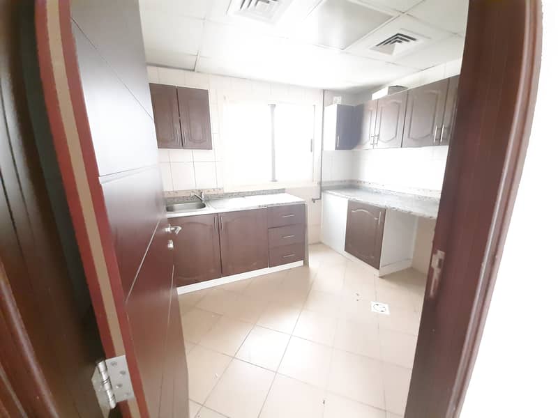 Nice 1 bed room and hall in 20000 AED area 850sqft with 2 washrooms in Muwaileh 1 month No Deposit