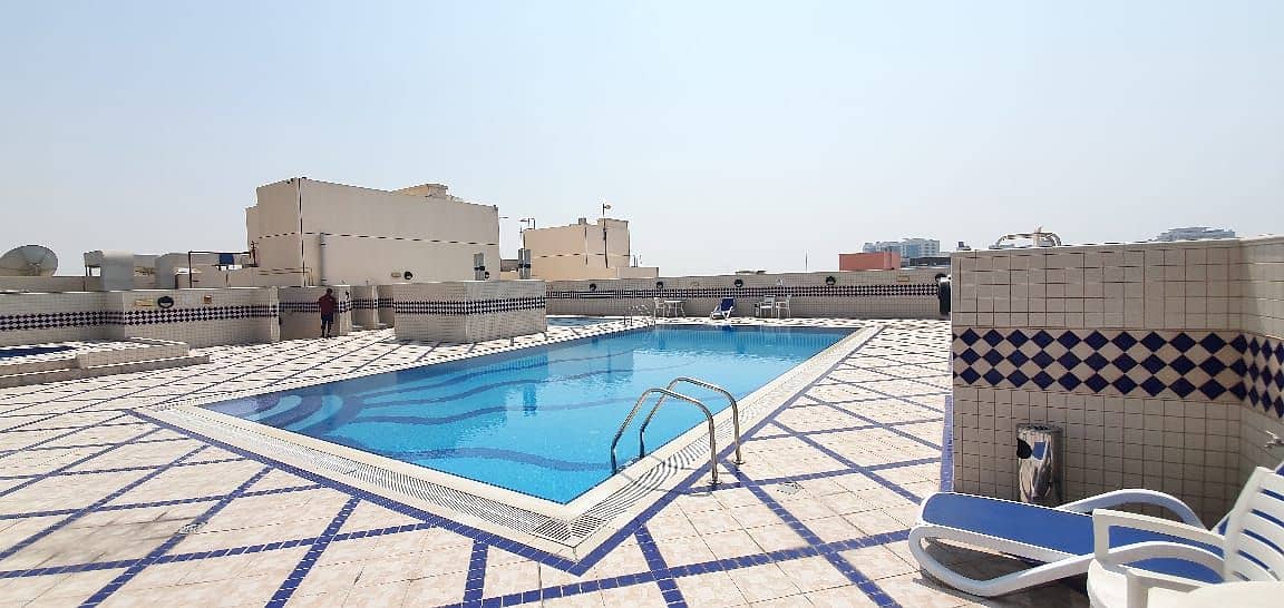 Chiller Free  1 Month Free Super Studio with Full Facilities Front of bus Stop Rent only 26k in al Nahda Dubai