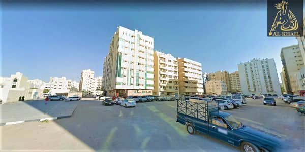 ارض سكنية  للبيع في الناصرية، الشارقة - ارض سكنية بالشارع العام خلف مستشفى زليخة