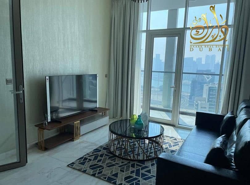 Apartment for sale with a view of Khalifa Tower and the canal  ready to move and fully furnished and instalment