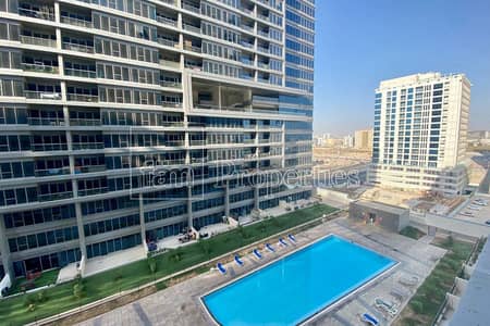شقة 1 غرفة نوم للبيع في مجمع دبي ريزيدنس، دبي - Mid Floor | Spacious Living Area | Pool View