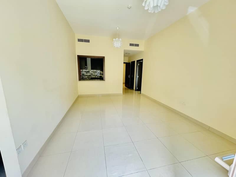 2 Garden View | Elegant apartment | American kitchen | Master bedroom | Front of University of Sharjah Road Al Zahia