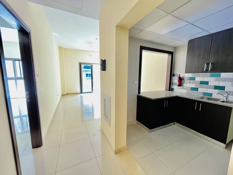 3 Garden View | Elegant apartment | American kitchen | Master bedroom | Front of University of Sharjah Road Al Zahia