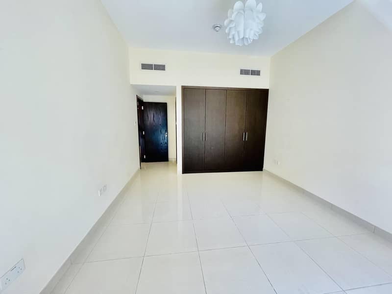 5 Garden View | Elegant apartment | American kitchen | Master bedroom | Front of University of Sharjah Road Al Zahia
