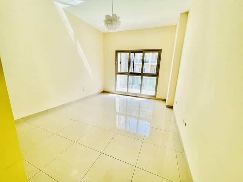 10 Garden View | Elegant apartment | American kitchen | Master bedroom | Front of University of Sharjah Road Al Zahia