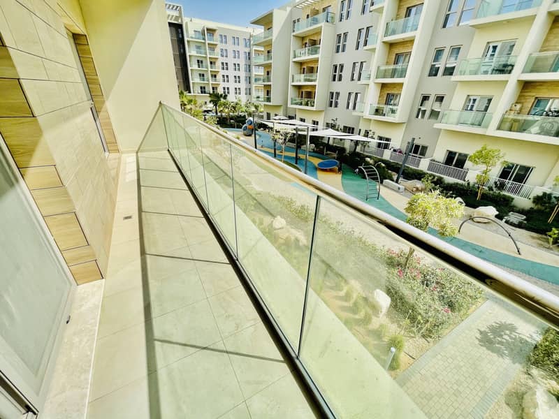 13 Garden View | Elegant apartment | American kitchen | Master bedroom | Front of University of Sharjah Road Al Zahia