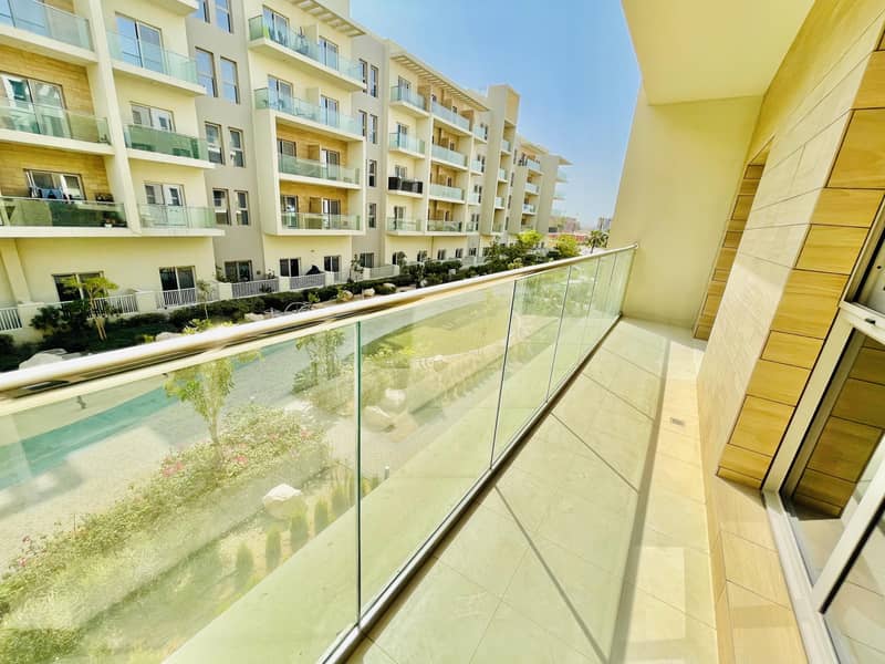 14 Garden View | Elegant apartment | American kitchen | Master bedroom | Front of University of Sharjah Road Al Zahia