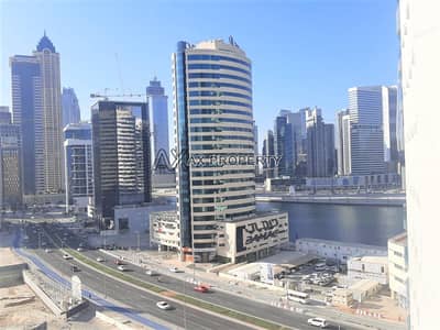 استوديو  للايجار في الخليج التجاري، دبي - شقة في برج اي جي الخليج التجاري 40000 درهم - 5507181