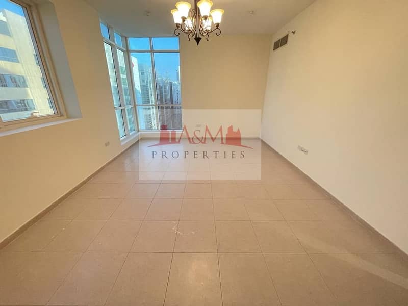 HOT OFFER. : Two Bedroom Apartment with Gym & Basement Parking for AED 65,000 Only. !!