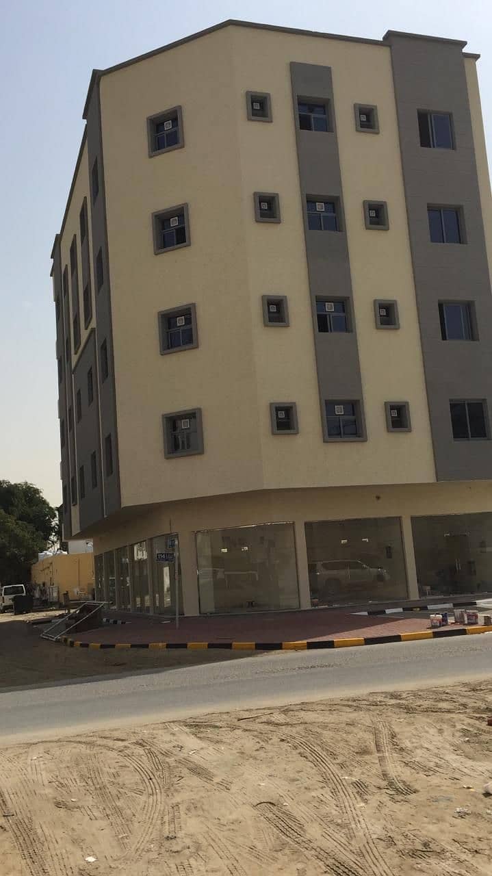 For sale, residential, commercial building, corner of three streets, in a very distinctive location, close to Ajman Port, Liura area, with a very special income