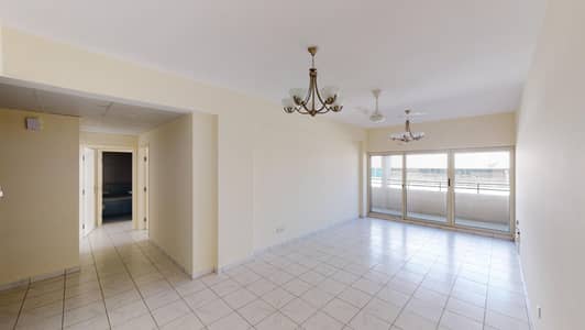 فلیٹ 2 غرفة نوم للايجار في الكرامة، دبي - شقة في بناية عالية الكرامة 2 غرف 60399 درهم - 5541977