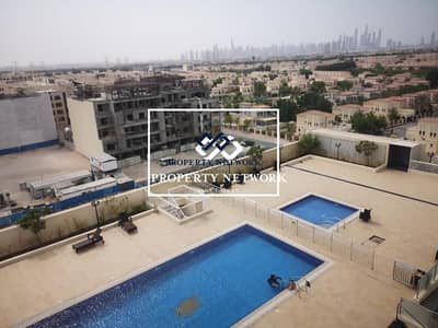 1 Bedroom Apartment for Rent in Jumeirah Village Triangle (JVT), Dubai - Pool and Townhouse view I Lowest