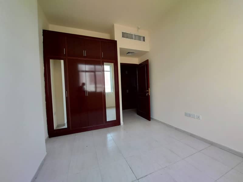 Fantastic 1 Bedroom Hall Aprt With Parking in Shabiya 9