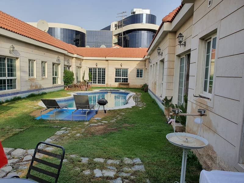 COZY 2BR VILLA FOR COUPLES OR BACHELORS WITH SHARED POOL AND PVT ENTRANCE | ALL EN-SUITE BED ROOMS
