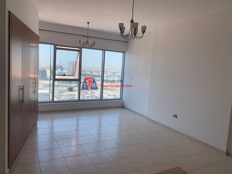 Pay 1835/- Per month Cheapest large Studio for rent in Sky Court Towers Dubai land