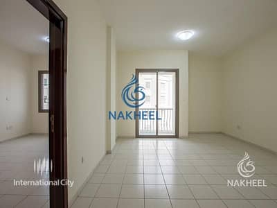 فلیٹ 1 غرفة نوم للايجار في المدينة العالمية، دبي - شقة في الحي الروسي المدينة العالمية 1 غرف 33000 درهم - 4806005