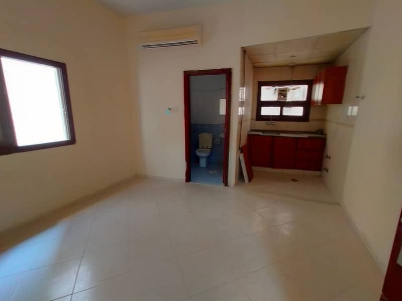 Studio close to Al Mubarak center with separate kitchen central Ac and gas only 09k Call M. Hanif