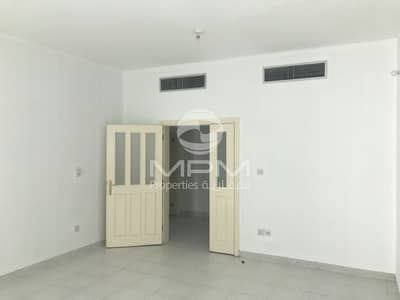 2 Bedroom Flat for Rent in Tourist Club Area (TCA), Abu Dhabi - Spacious Apt with Central AC and Balcony